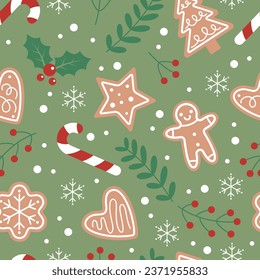 Gingerbread seamless pattern. Festive background with cookies, candies, leaves and berries on a green background.