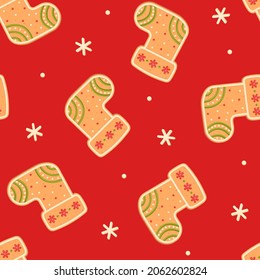Gingerbread  stocking. Christmas red seamless pattern with cookie in the form of socks and snowflakes. Stockings. Isolated vector stock illustration EPS 10.
