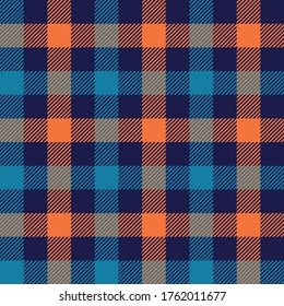 Gingham pattern in blue and orange. Seamless vichy check plaid graphic for tablecloth, wrapping, packaging, or other modern autumn winter fabric design.