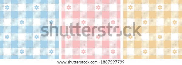 Gingham pattern set. Floral checked plaids in
blue, pink, yellow, white. Seamless pastel vichy tartan backgrounds
with small flowers for tablecloth, dress, or other Easter holiday
textile design.