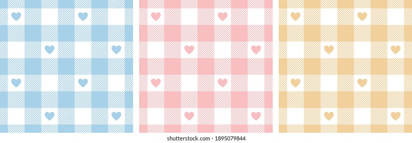 Gingham patterns with hearts in pastel pink, blue, yellow, white. Seamless tartan vichy check plaid for dress, shirt, tablecloth, gift wrapping, or other modern Valentines Day or Easter holiday print.