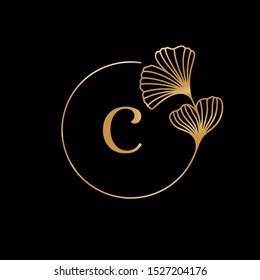 Ginkgo Biloba Leaf gold frame with copy space. Badge and icon in trendy linear style. Vector Logo Emblem with letter C and gingko. Template for packing Cosmetics, Medicines, organic food