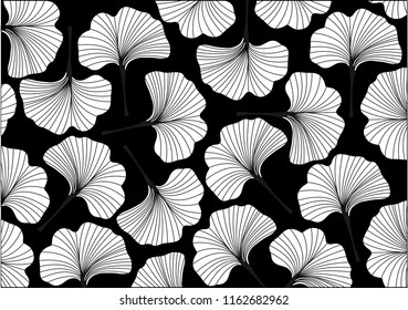 Ginkgo biloba leaves pattern on black background.