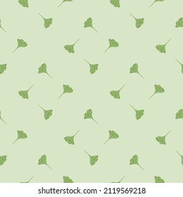 Ginkgo biloba seamless pattern. Beautiful plant background. Repeated texture in doodle style for fabric, wrapping paper, wallpaper, tissue. Vector illustration.