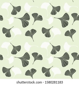 Ginkgo biloba tree leaf vector digital seamless pattern. Silhouette of green, yellow and light green leaves of ginkgo. Isolated vector illustration. Natural design for various textiles and the design 