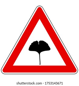 Ginkgo leaf and attention sign on white
