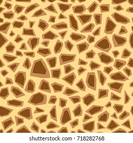 Giraffe texture. Seamless animal pattern. Imitation print of skin of giraffe. Brown spots on beige background. Vector

