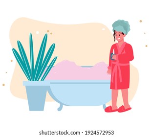 a girl after a bath in a Bathrobe and with a towel on her head drinks tea, a girl after bath procedures and Spa