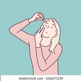 A girl applying artificial tears. Hand drawn style vector design illustrations.