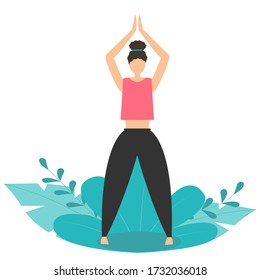 The girl in the asana practices yoga on the fresh air.