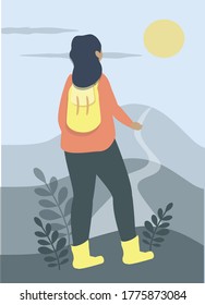 girl with a backpack goes camping