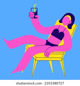 Girl bathing suit unbathing on a chaise lounge with a cocktail