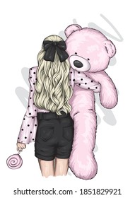 A girl with beautiful hair and a teddy bear. Love, Valentine's Day.