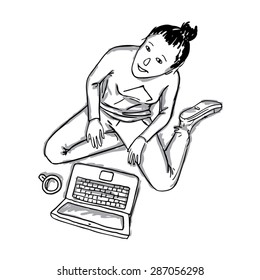 The girl behind the laptop looks upwards