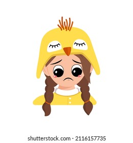 Girl with big eyes and sad emotions, depressed face, down eyes in cute yellow chicken hat. Head of child with melancholy expression for Easter, New Year or costume for party. Vector flat illustration