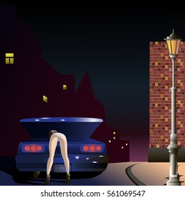 Girl in a bikini and high heels leaned into the open trunk of a car, standing near the brick wall on the night street in the light of a street lamp