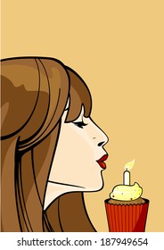 Girl with a birthday cupcake