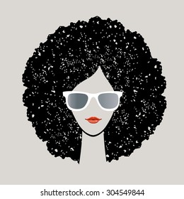 Girl with black afro and sunglasses