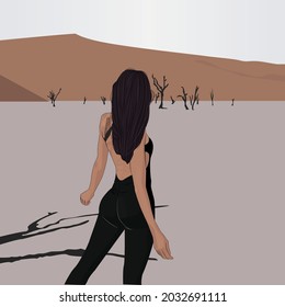 girl in black clothes stands in the desert
