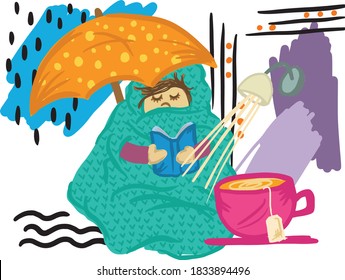 Girl in blanket with book and cup of tea