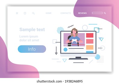 girl blogger commentating game process video review blogging live streaming concept gamer in headphones using gamepad playing games monitor screen portrait horizontal copy space