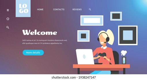 girl blogger commentating game process video review blogging live streaming concept gamer in headphones using gamepad playing games on laptop portrait horizontal copy space
