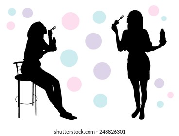 Girl blow bubbles silhouette