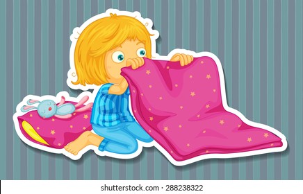 Girl in blue pajamas folding blanket