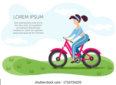 Girl in a blue suit rides a bicycle in nature.