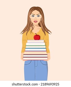 Girl with books in her hands goes to school