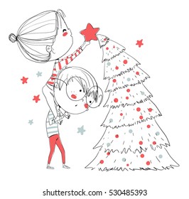 Girl and boy decorating the Christmas tree.