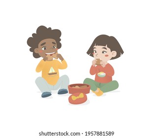 girl and boy eat cookies 