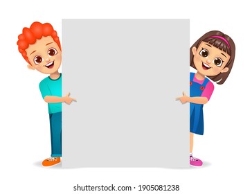 girl and boy showing blank board with index finger