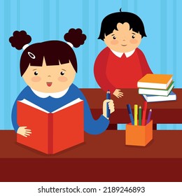 Girl and boy sit at different desks