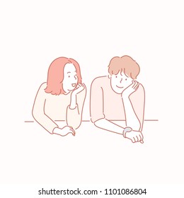 The girl and the boy are sitting at the table with their hands jawed. hand drawn style vector doodle design illustrations.