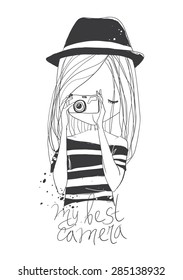 Girl with camera and lettering