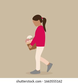 Girl carries a large glass of ice cream in her hands