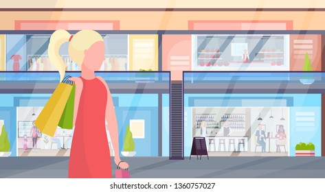 girl carrying colorful shopping bags big sale concept woman walking modern retail mall with clothes and coffee shops supermarket interior horizontal portrait flat