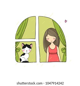 girl and cat at the window.  Spring day. Favorite pet
