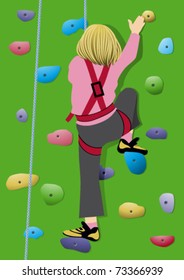 Girl climbing artificial rock