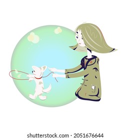 A girl in a coat with a light colored dog walking an autumn day. The girl is keeping the dog on a leash and pointing on trees with falling leaves on background. The dog is going to catch some leaves.