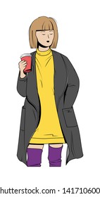 A girl in a coat with a paper Cup of coffee. Street style