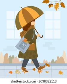 A girl in a coat and with a scarf around her neck is walking along an autumn street under an umbrella. On the shoulder is a bag with colored leaves. Vector illustration in flat style