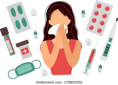 Girl with a cold sneezes into  handkerchief. Medicines, pills, syringe, mask