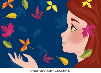 A girl collects autumn leaves