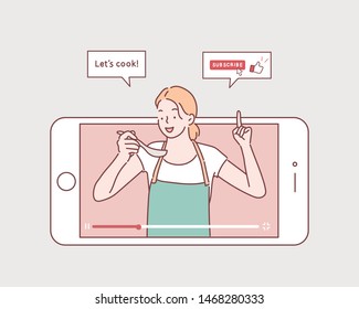 Girl cooking. Concept of video blogging.   Hand drawn style vector design illustrations.