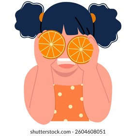 A girl covering eyes with orange halves