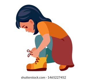 girl crouched and tying the laces on the shoes svg