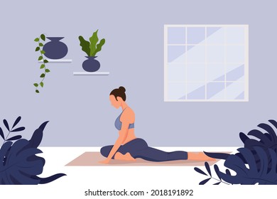 Girl does yoga online at home on TV. Yoga pose for strengthening the body and spirit. Favorite hobby