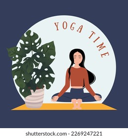 The girl does yoga. A woman is doing physical exercises. A girl in a T-shirt and leggings.